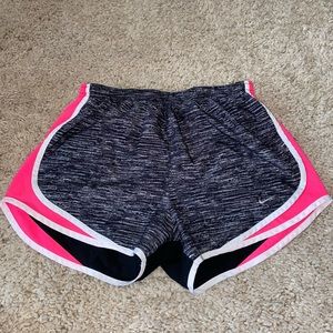 black and grey Nike shorts with pink accent